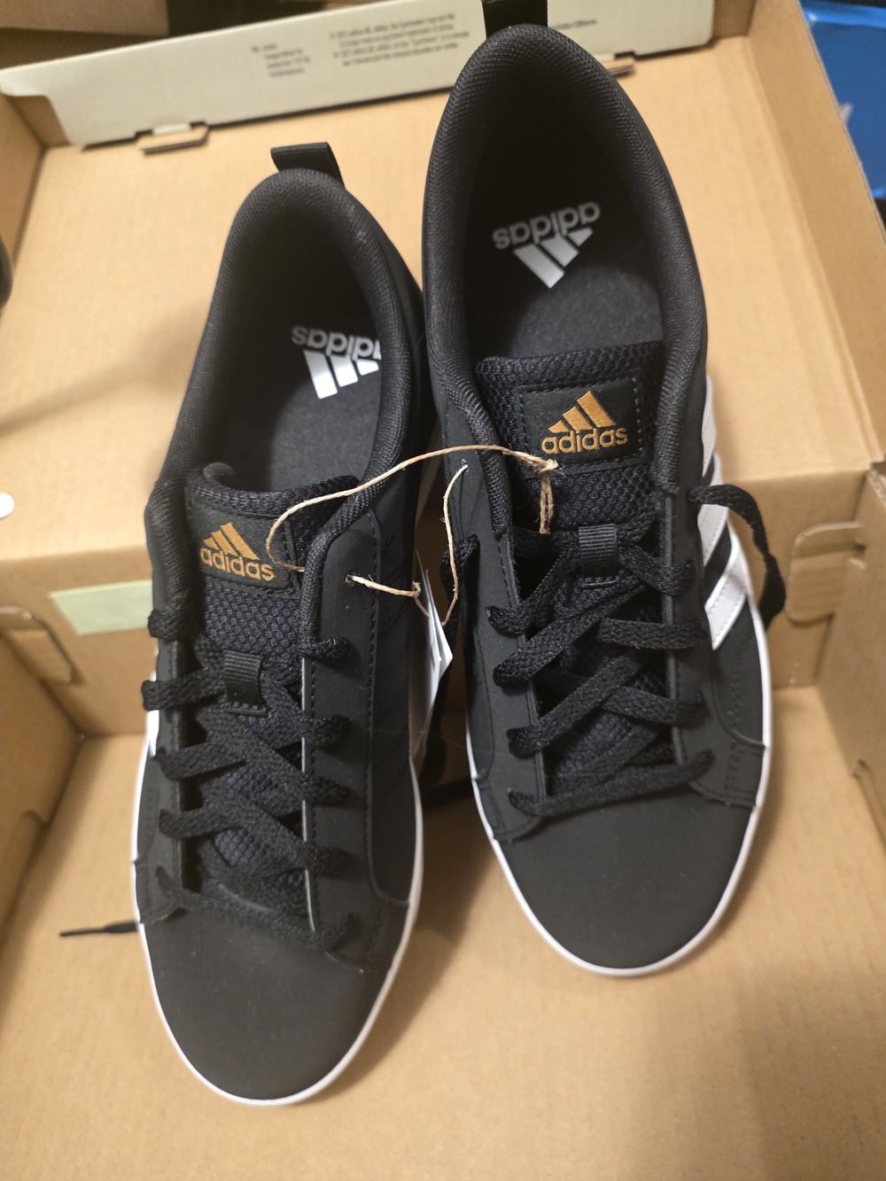 adidas Black Sneakers with White Stripes and Gold Logo